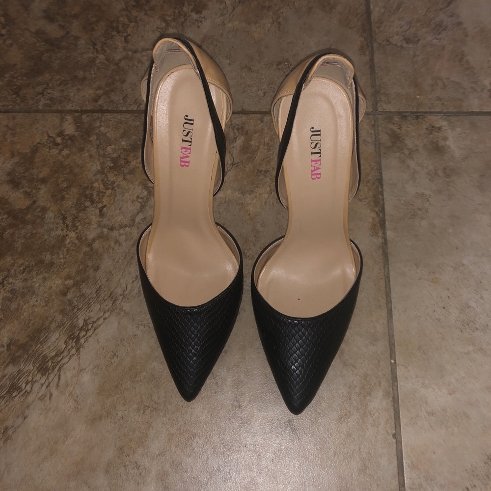 Nude and black pointy toe heels